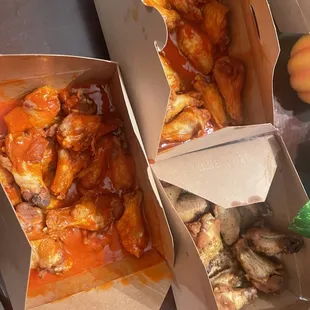 a variety of wings in boxes