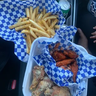 Cheesy garlic, medium hot wings and fries.