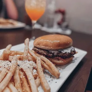 a burger and french fries on a plate