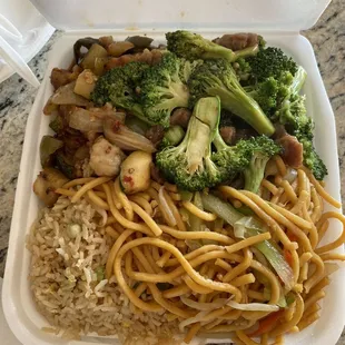 Plate with two entrees- Beef/Broccoli and Spicy Chicken. Half and Half (Rice and Chow Mein)