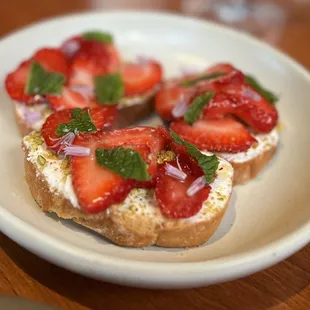 Strawberry Crostini - sweetness of the strawberries and honey perfectly offset the savory richness of the whipped feta