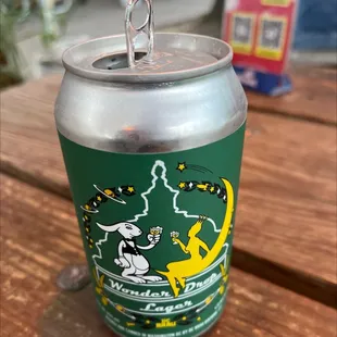 a can of beer on a table