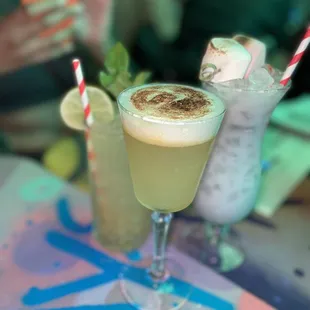 two cocktails on a table