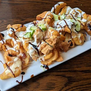 09/16/22 Woodbury Nachos - Sidewinder Fries, Fried Chicken, Bacon, White Cheddar Cheese, Chive Ranch, Balsamic Gastrique