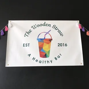 a banner hanging on a wall