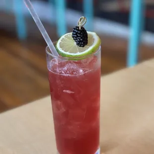 a drink with a lime slice on the rim