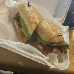 a sandwich in a styrofoam container