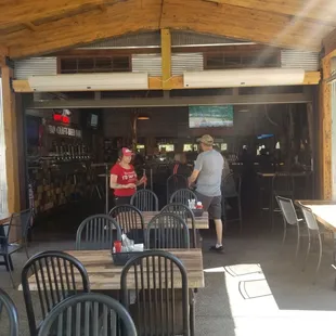 two people standing in the doorway
