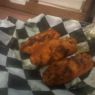 Sorry i couldn't wait but these grilled hot chicken wings are insane has that "let me get one more bite" heat and great size