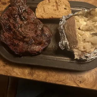 Ribeye steak with baked potato