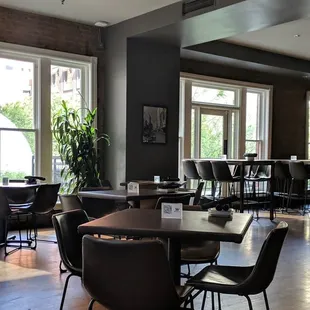 a restaurant with tables and chairs