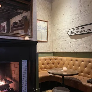 Booth by the fireplace