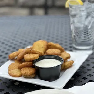 a plate of fried tater tots