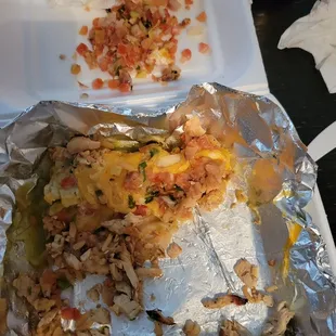Ordered a chicken wet burrito. Specifically asked for no sour cream and no pico de gallo. Very disappointed not a happy customer