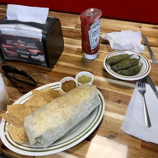 California Burrito, Contains Carne Asada Fries, guacamole, sour cream, cheese, and pico...