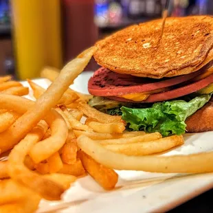 a plate of fries and a sandwich