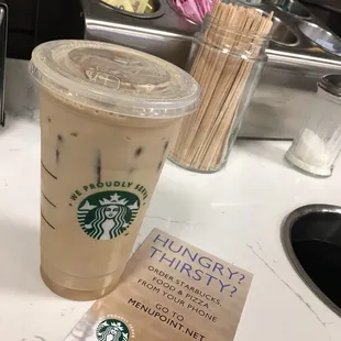 a cup of coffee and a book