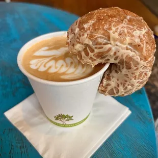 a cup of coffee and a donut