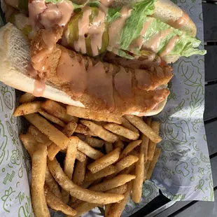 Catfish po&apos;boy and fries