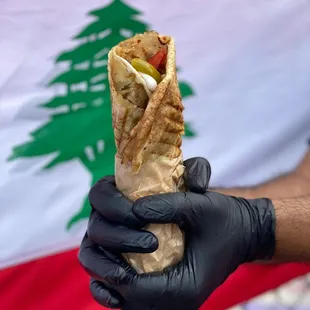 a person holding a wrap