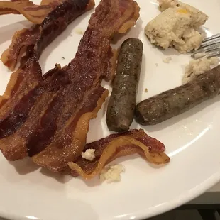 Bacon sausage and some kind of grits