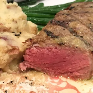 a steak and mashed potatoes