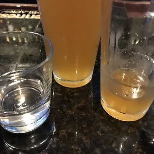 a glass of beer and a glass of water
