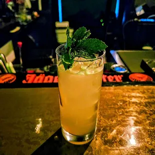 A mezcal based cocktail the bartender whipped up.