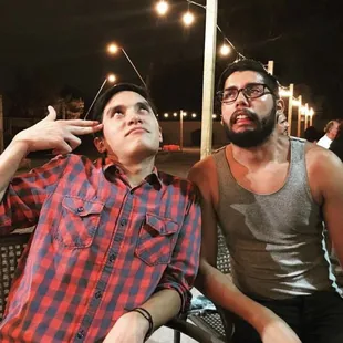 two men sitting at a table