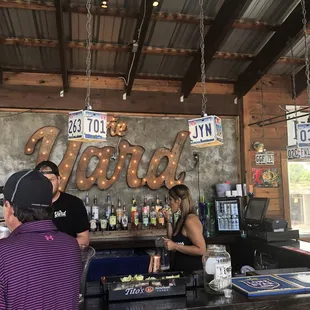 a man and woman at a bar