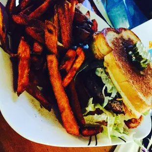 Two grilled cheese sandwiches with 1/3 lb burger  with ranch dressing. Side of sweet potato fries. Yes please!!