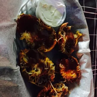 Pig Skins. Potato skins with BBQ pork and side of sour cream. Great combo taste!! Repeat!