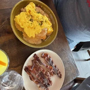 a person sitting at a table with food