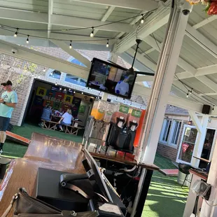 a table with a laptop and a bag on it