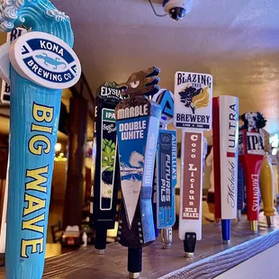a row of beer taps