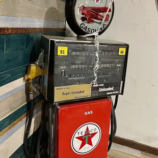 a gas pump and a clock