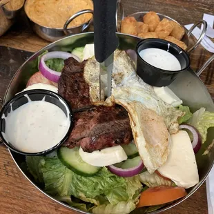Steak Salad (sub. Tots on side) ... Runny Egg was unexpected ...(server said it would be hard boiled) . . .