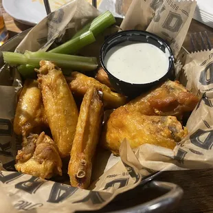 Wings by the pond which is 7 wings! I think the sauce could be better it was more oil then anything