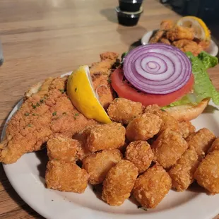 Catfish sandwich with tots