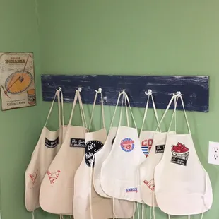 These are some of our adult and kids aprons that we design and make at the farm.