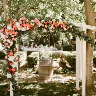 Arch and wine barrel available for day of rental! So great for an altar.