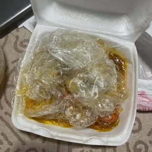 a plastic container filled with food