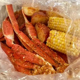 Snow crab legs, potatoes, and corn. The yummy special sauce with extra hot!