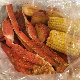 Snow crab legs, yummy special sauce, extra hot