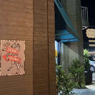 a sign on the side of a building