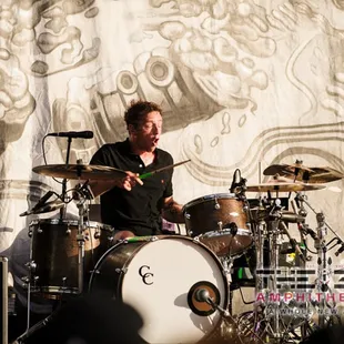 a man playing drums