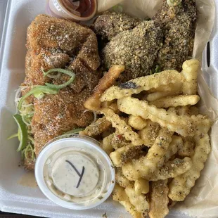 Chicken and Fish combo (fried Salmon in the one) w/ fries.