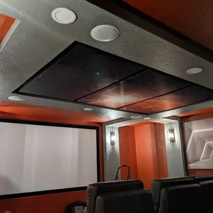 Hard to believe this room started a naked concrete box under the garage!