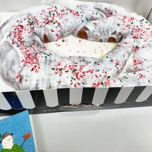 a frosted donut in a box