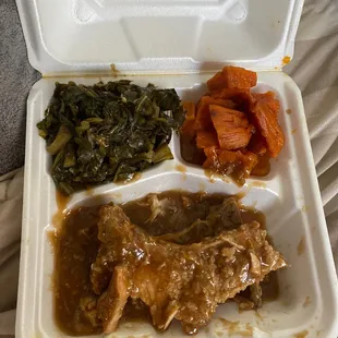 Dried out smothered pork chops, yams and greens. Best thing was the yams.